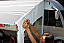 Side panel hangs from aluminium rafter with clips to seal to awning roof