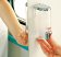 Wall mounted soap dispenser for caravan bathrooms